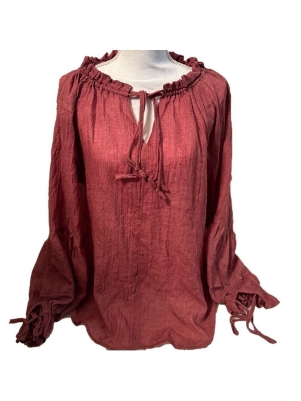 P.S. Love Smocked Cuff Poet Shirt.
NEW. Size Small. Rust/Burgundy Color